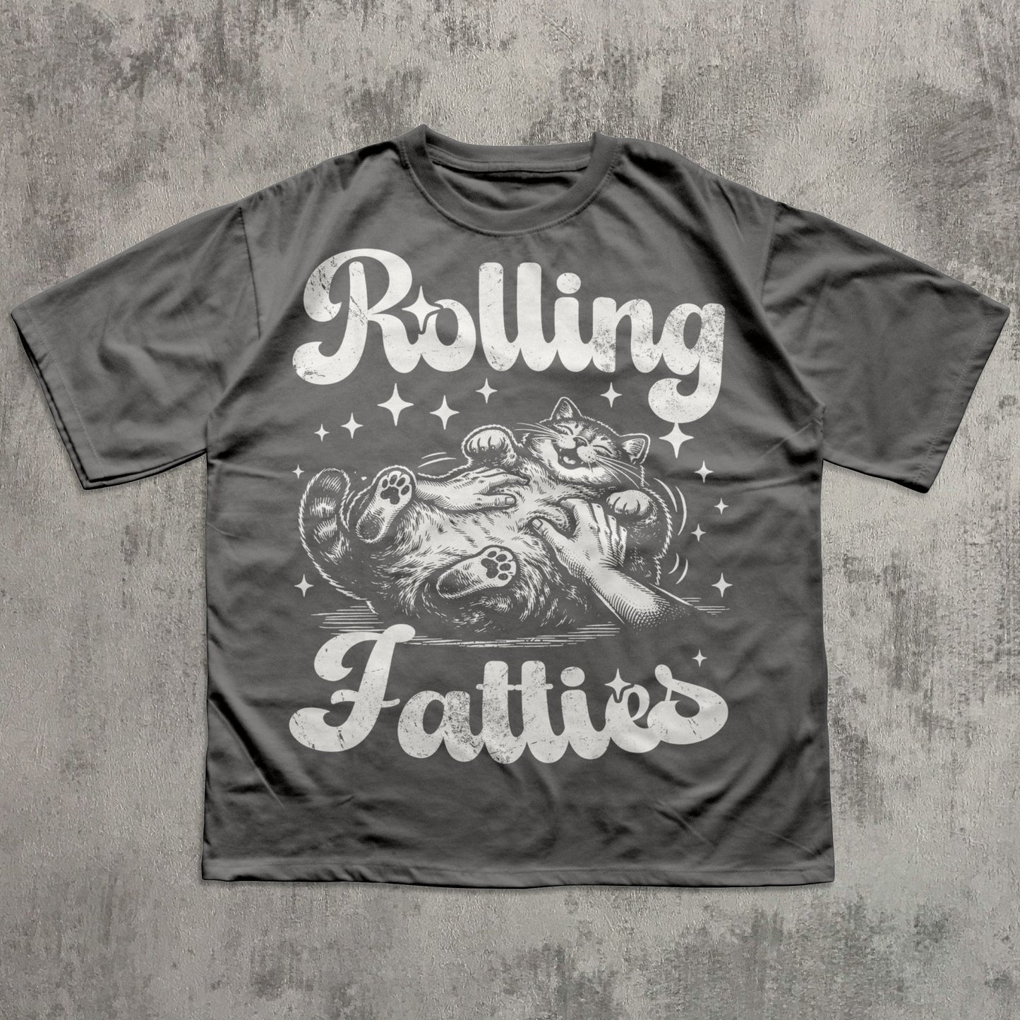 Gray t-shirt with 'Rolling Fatties' graphic design on a textured gray background