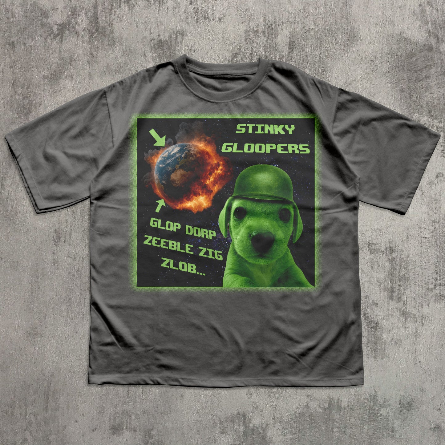 Gray funny t-shirt with a graphic design featuring a green alien dog and text on a concrete background
