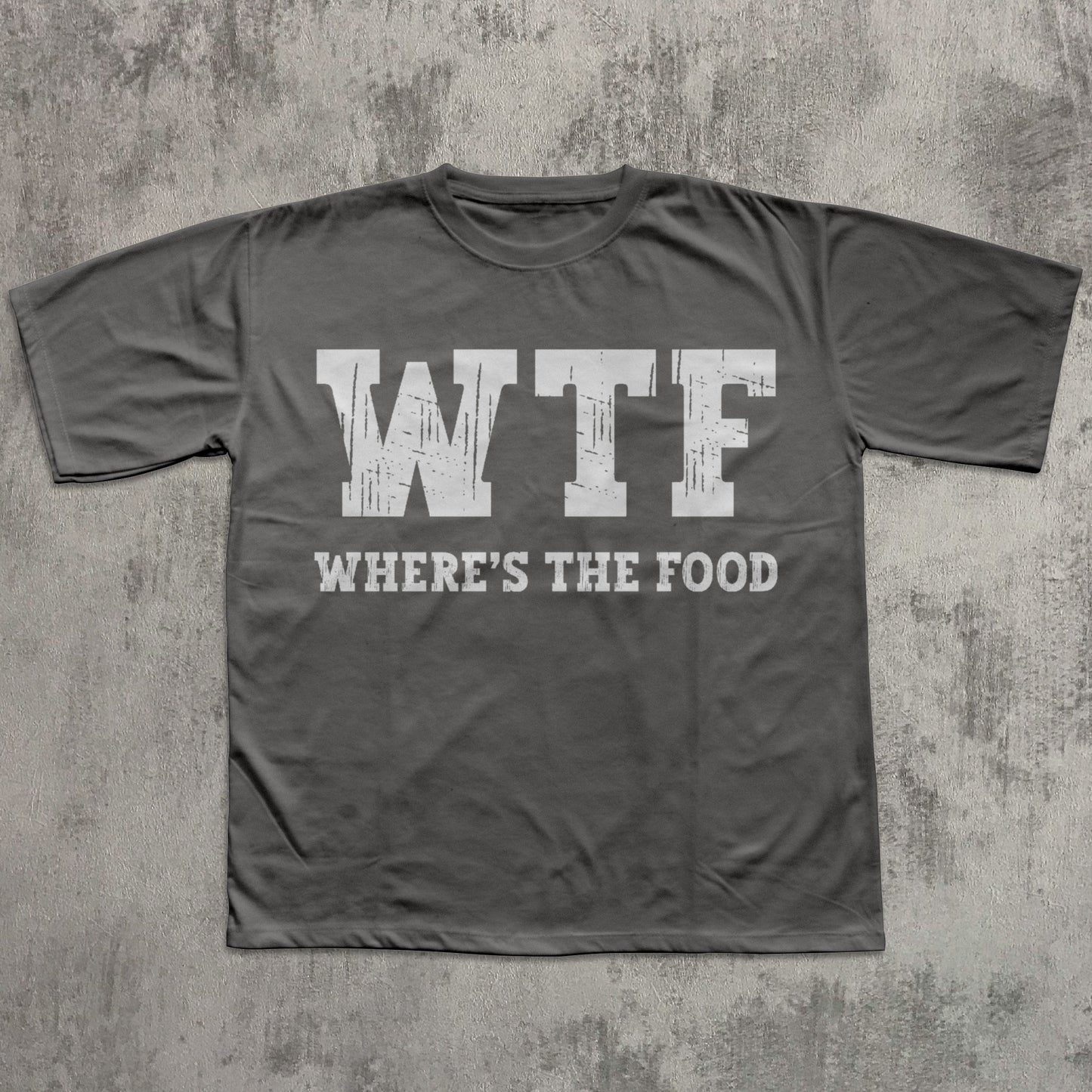Gray t-shirt with 'WTF WHERE'S THE FOOD' text on a textured gray background