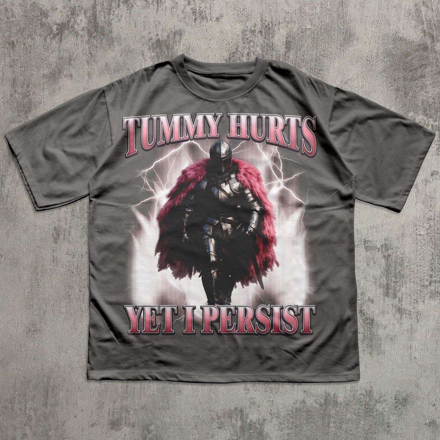 T-shirt with warrior graphic and text 'Tummy Hurts Yet I Persist' on a textured gray background