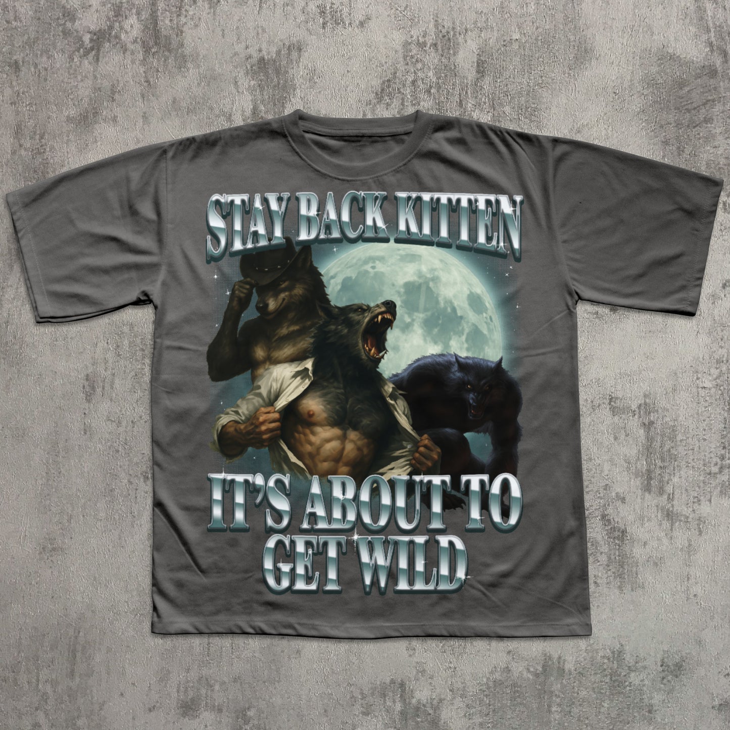 Gray t-shirt with graphic design of a man and panthers with text 'Stay Back Kitten, It's About to Get Wild' on a textured gray background.