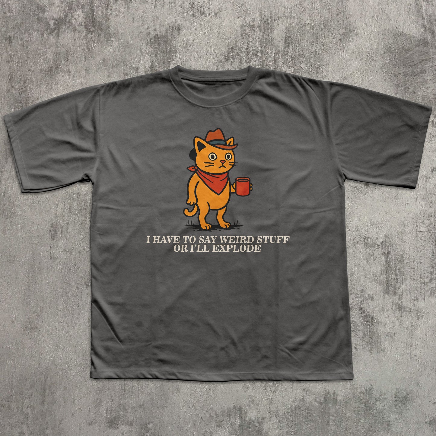 Gray t-shirt with a cartoon cat graphic and text on a textured gray background