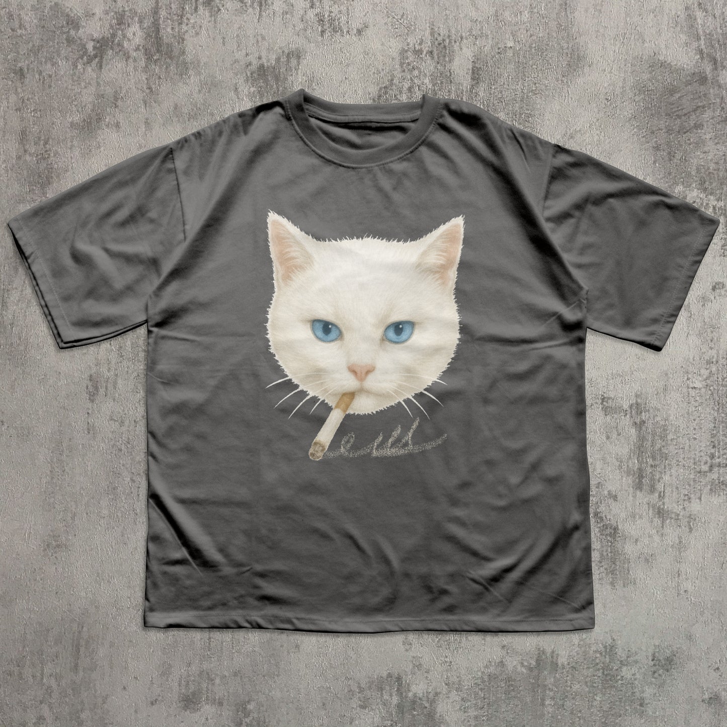 Gray t-shirt with a graphic of a white cat with blue eyes and text on a textured gray background