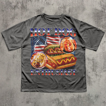 Gray t-shirt with hot dog graphic and 'Hot Dog Enthusiast' text on a textured gray background