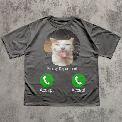 Gray t-shirt with a cat graphic and 'Freaky Department' text on a textured gray background