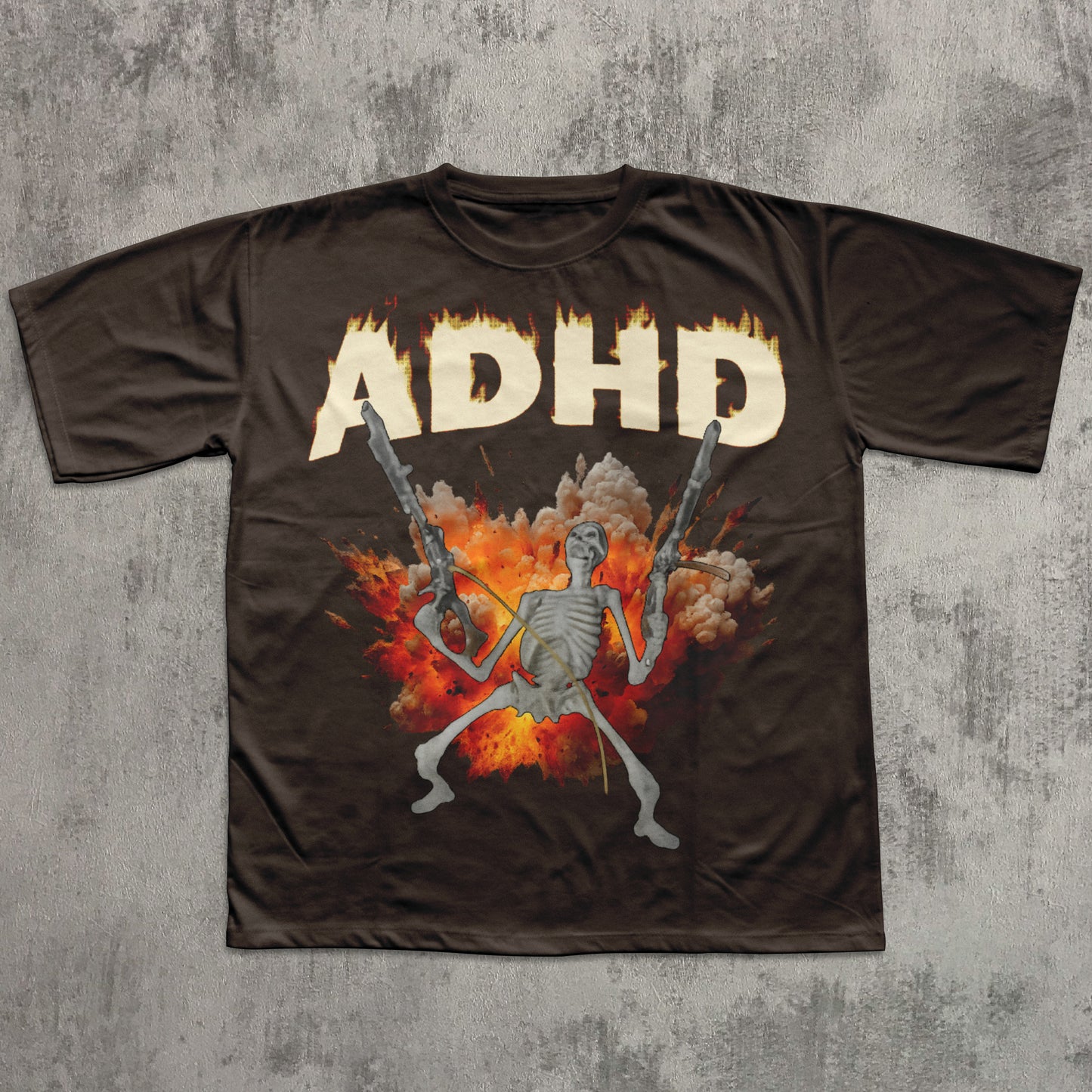 Brown t-shirt with skeleton holding guns and 'ADHD' in flames on a concrete background
