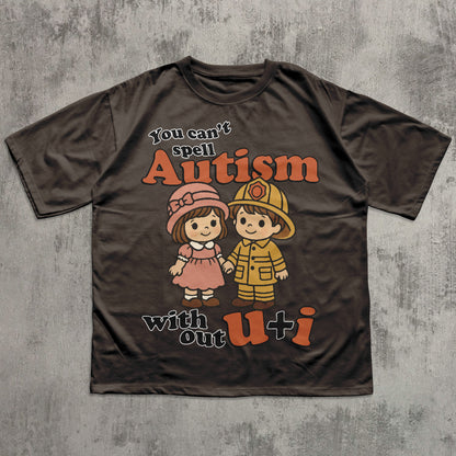 Brown t-shirt with cartoon characters and text on a textured gray background