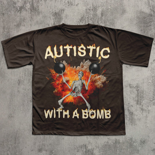 Brown t-shirt with a skeleton holding bombs and 'Autistic with a Bomb' text on a concrete background