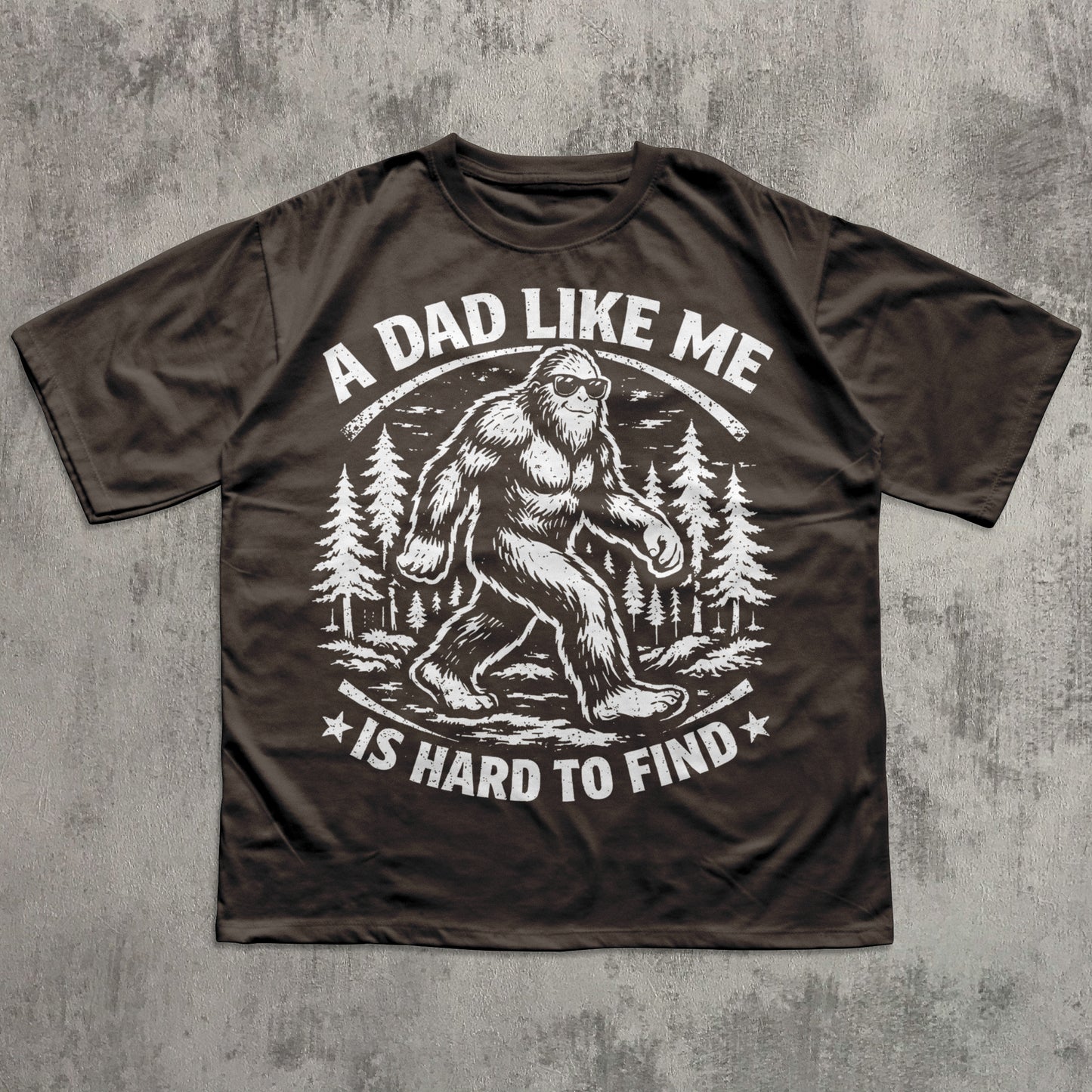 Funny Bigfoot dad T-shirt with retro Sasquatch forest graphic and quote “A Dad Like Me Is Hard to Find
