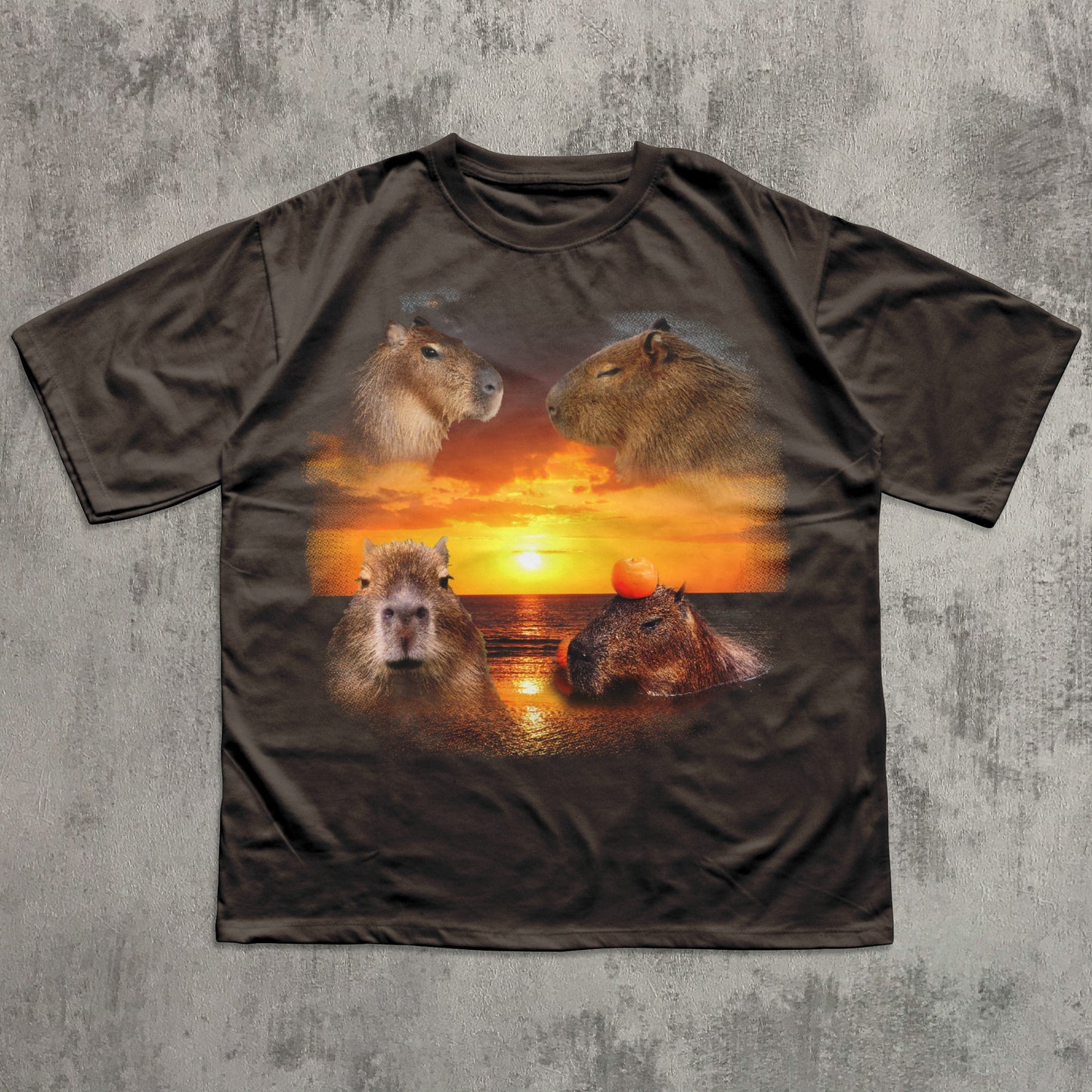 T-shirt with capybara design on a sunset background
