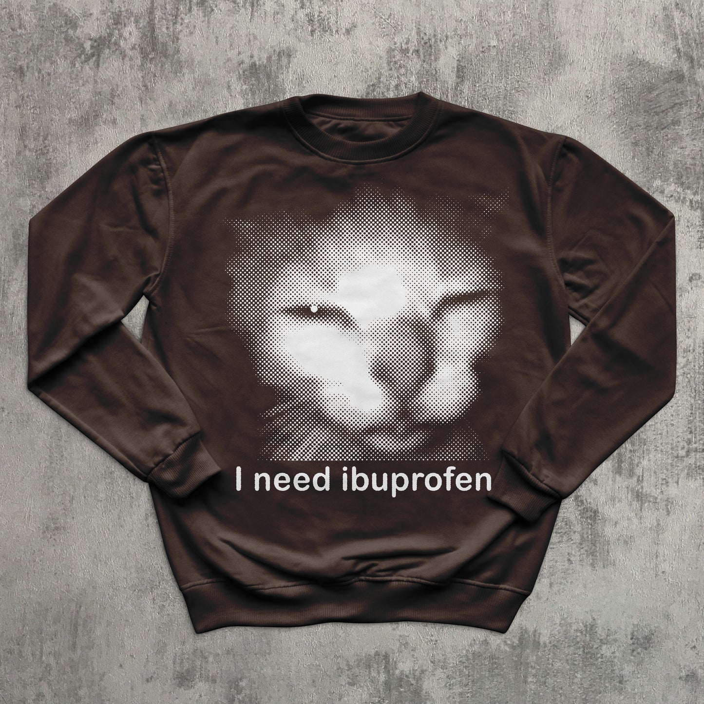 Brown sweatshirt featuring funny distressed cat meme with text ‘I need ibuprofen.
