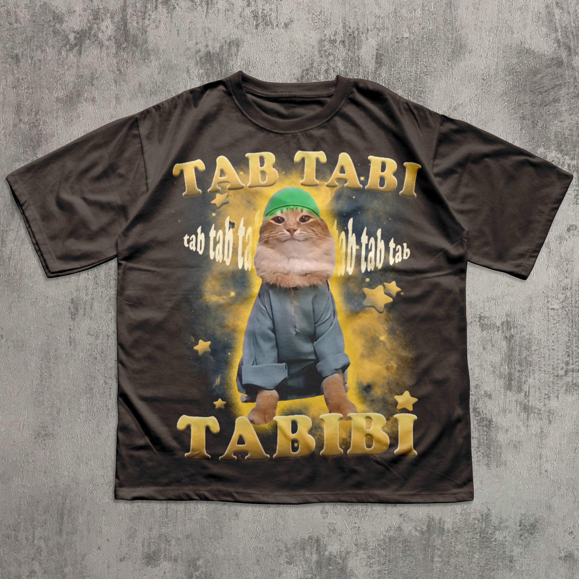 Funny T-shirt with a cat graphic and text on a textured gray background