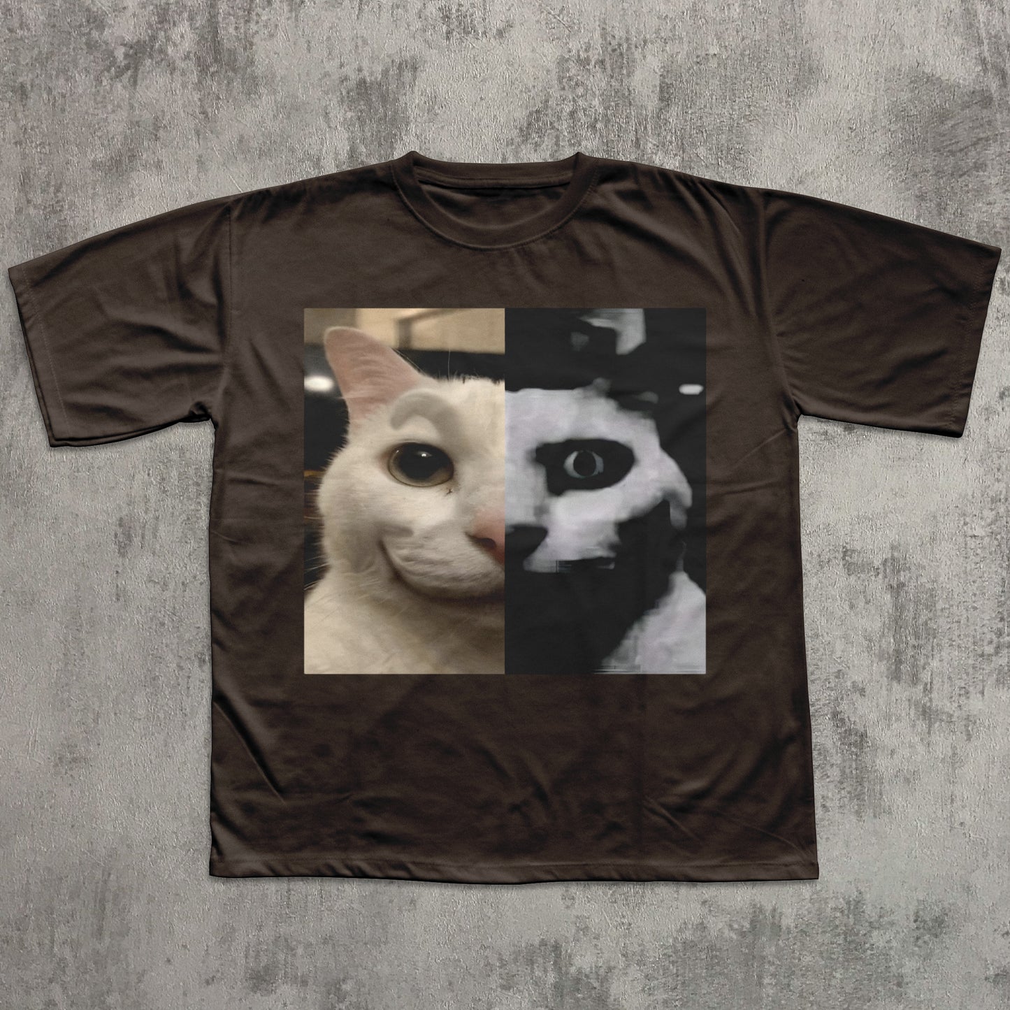 Brown t-shirt with a cat face design on a textured gray background
