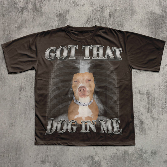 T-shirt with a graphic of a dog and text 'Got That Dog In Me' on a textured gray background