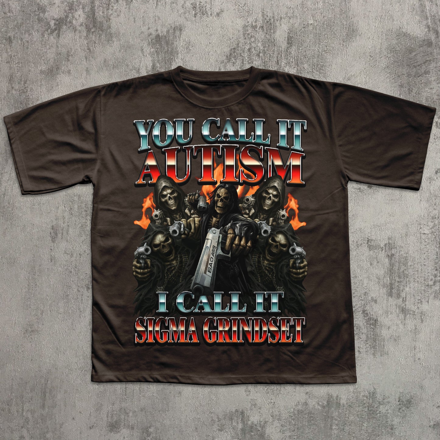 Brown t-shirt with graphic design and text on a textured gray background