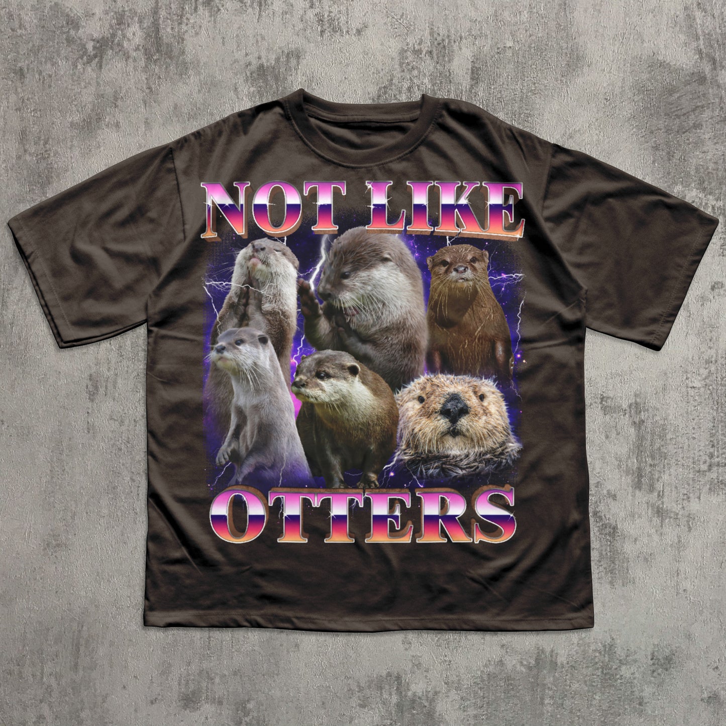 Brown t-shirt with otter graphic and text 'Not Like Otters' on a textured gray background
