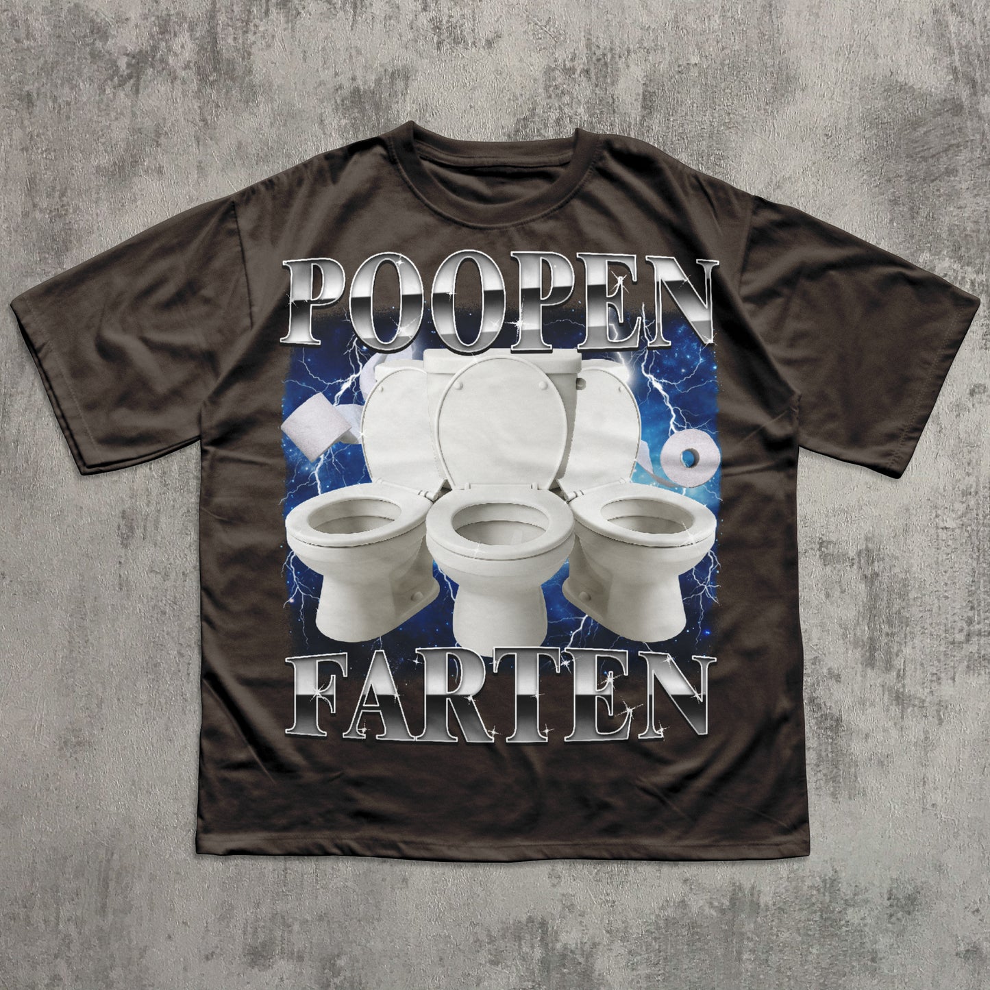 Brown t-shirt with graphic of toilets and text 'POOPEN FARTEN' on a textured gray background