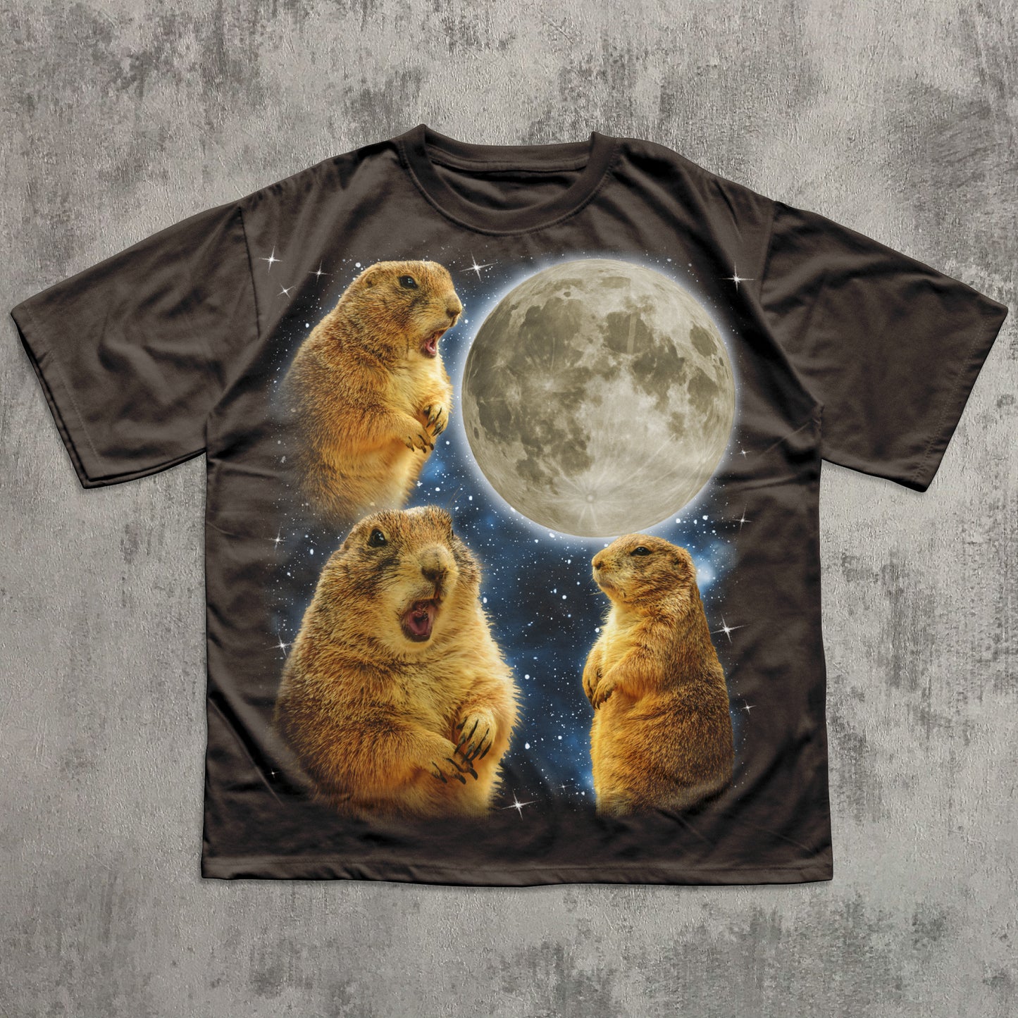 T-shirt with three prairie dogs and a moon graphic on a textured gray background