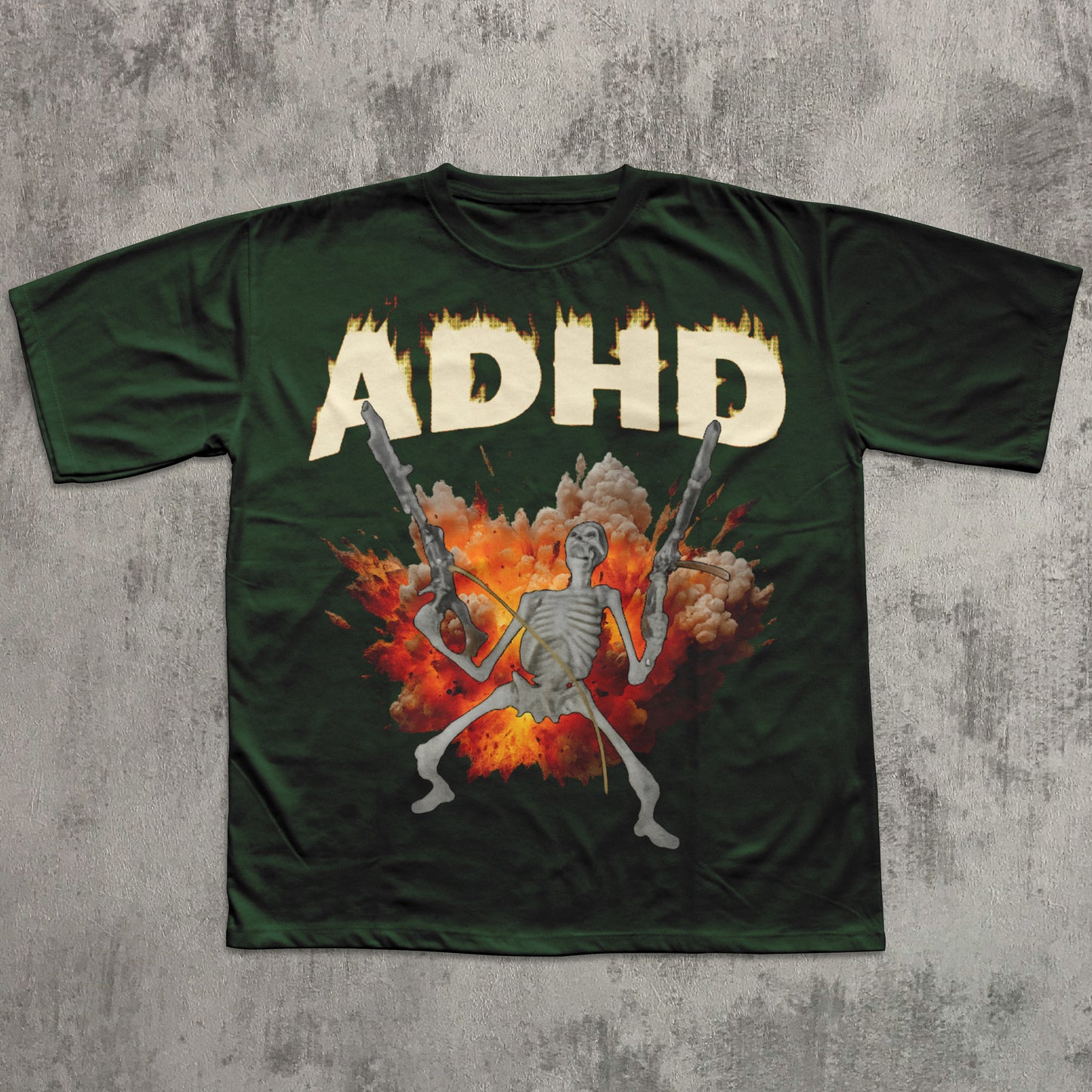 Green t-shirt with a skeleton holding guns and 'ADHD' in flames on a concrete background