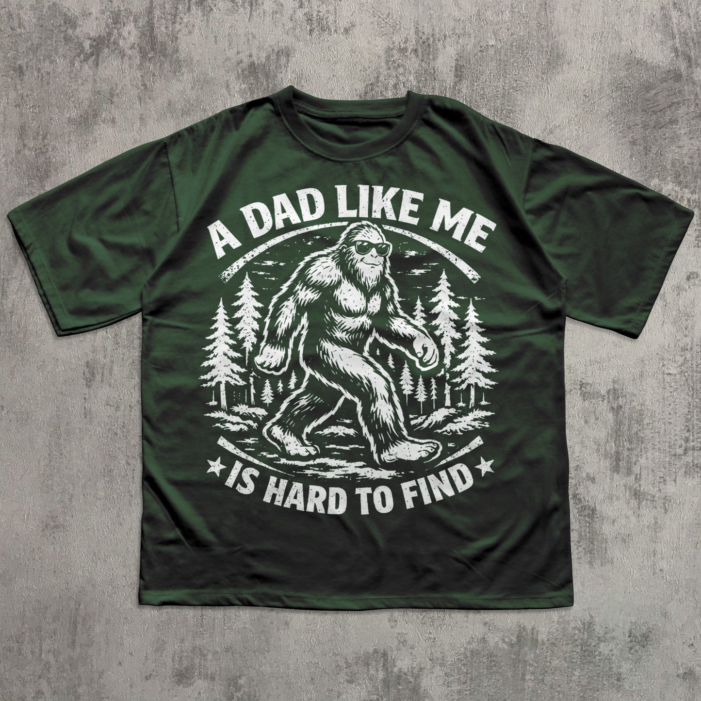 Vintage style Bigfoot Father’s Day shirt with distressed forest illustration and funny dad quote “A Dad Like Me Is Hard to Find”