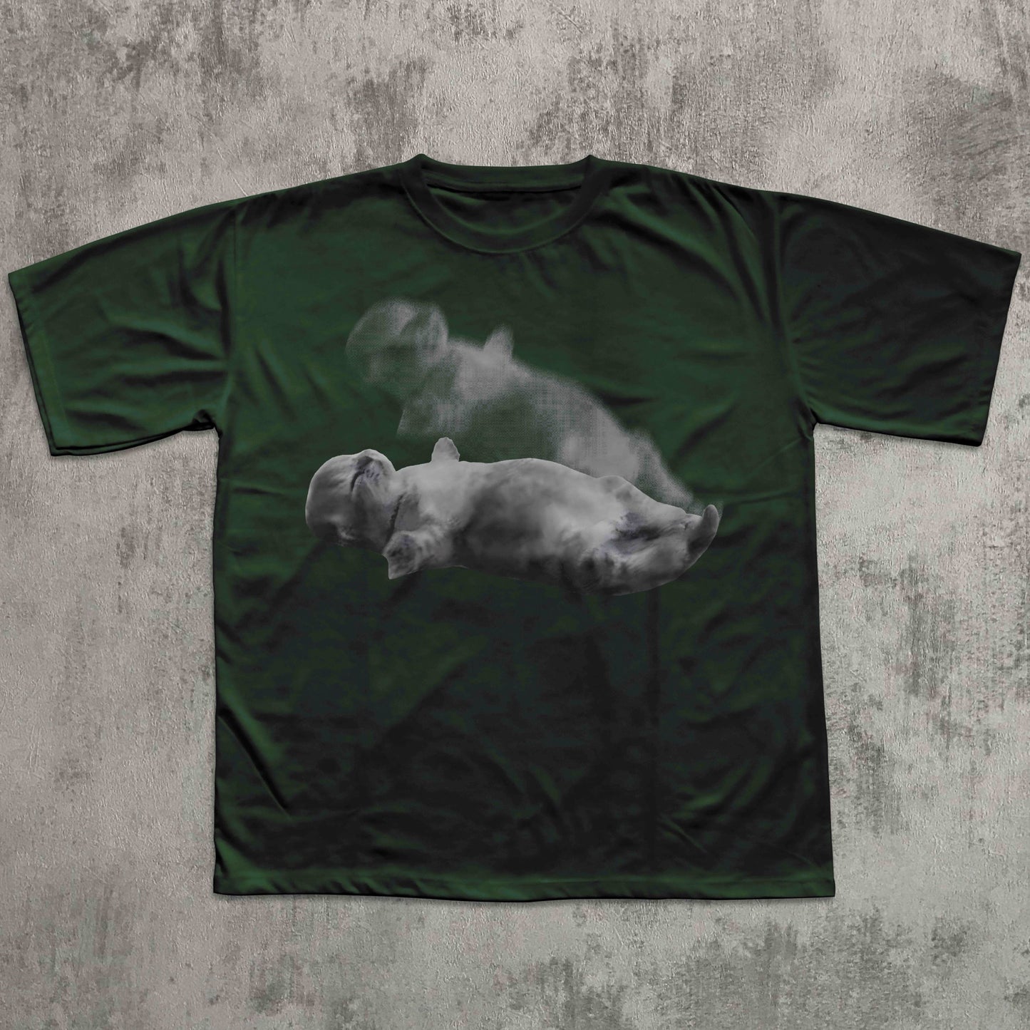 Green t-shirt with a graphic of two bears on a textured gray background
