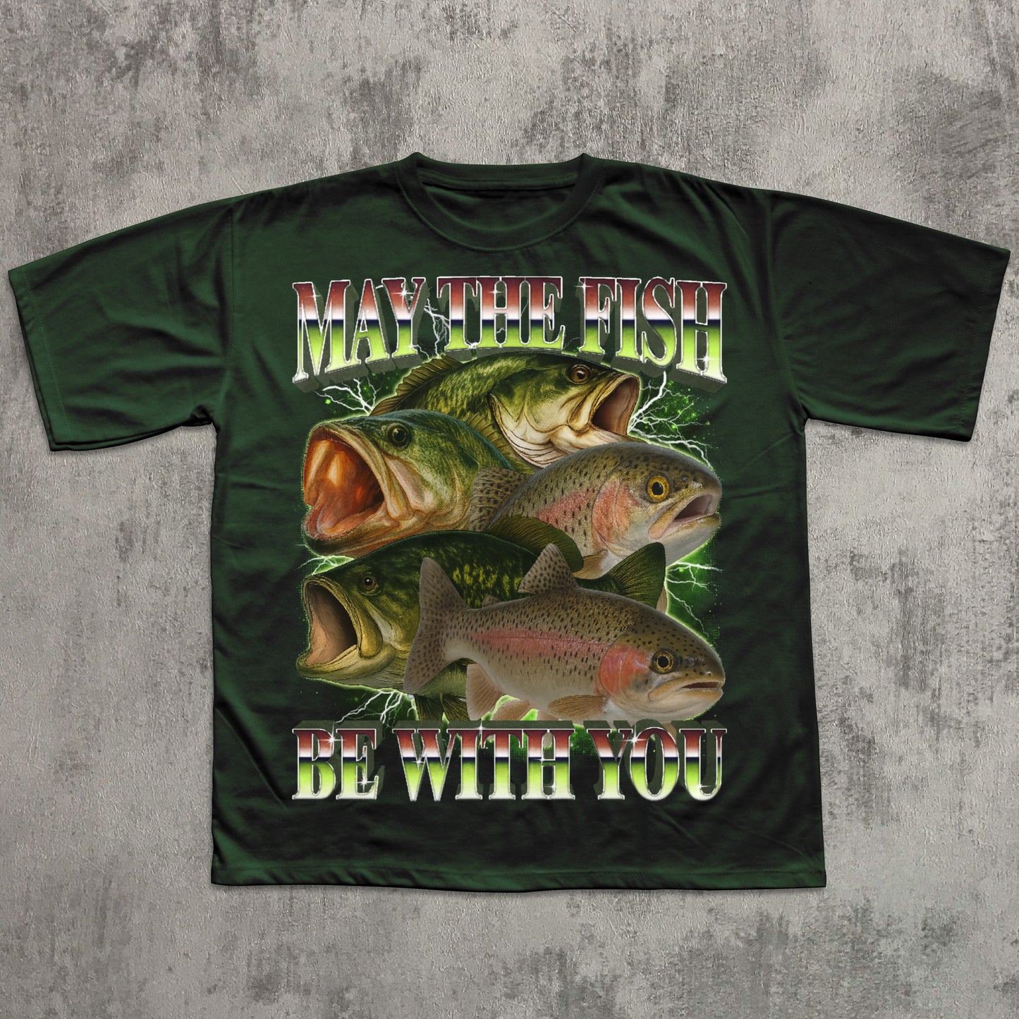 Green t-shirt with fish graphic and text on a textured gray background