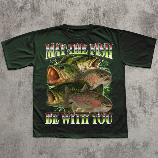 Green t-shirt with fish graphic and text on a textured gray background