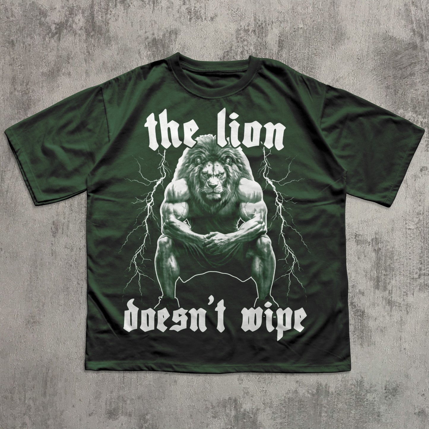 Green t-shirt with a lion graphic and text on a textured gray background