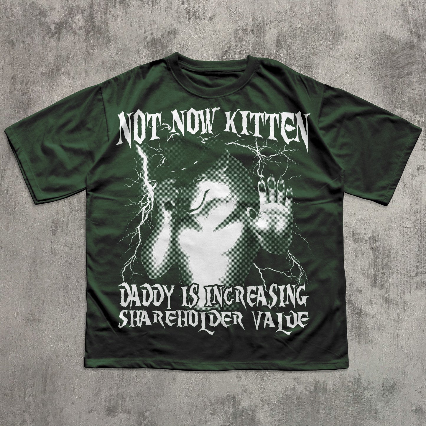 Green t-shirt with graphic design and text on a textured gray background