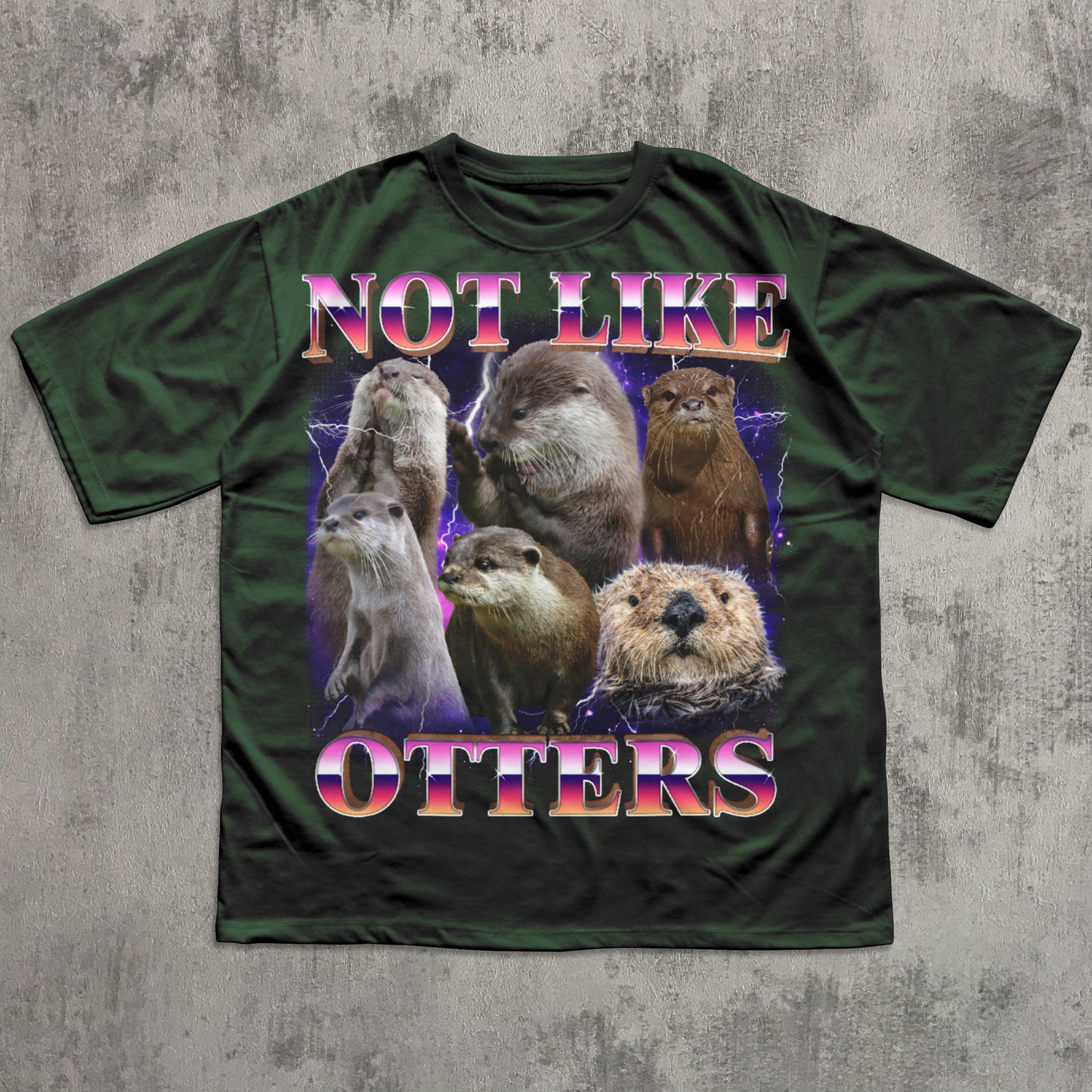 Green t-shirt with otter graphic and text 'Not Like Otters' on a textured gray background