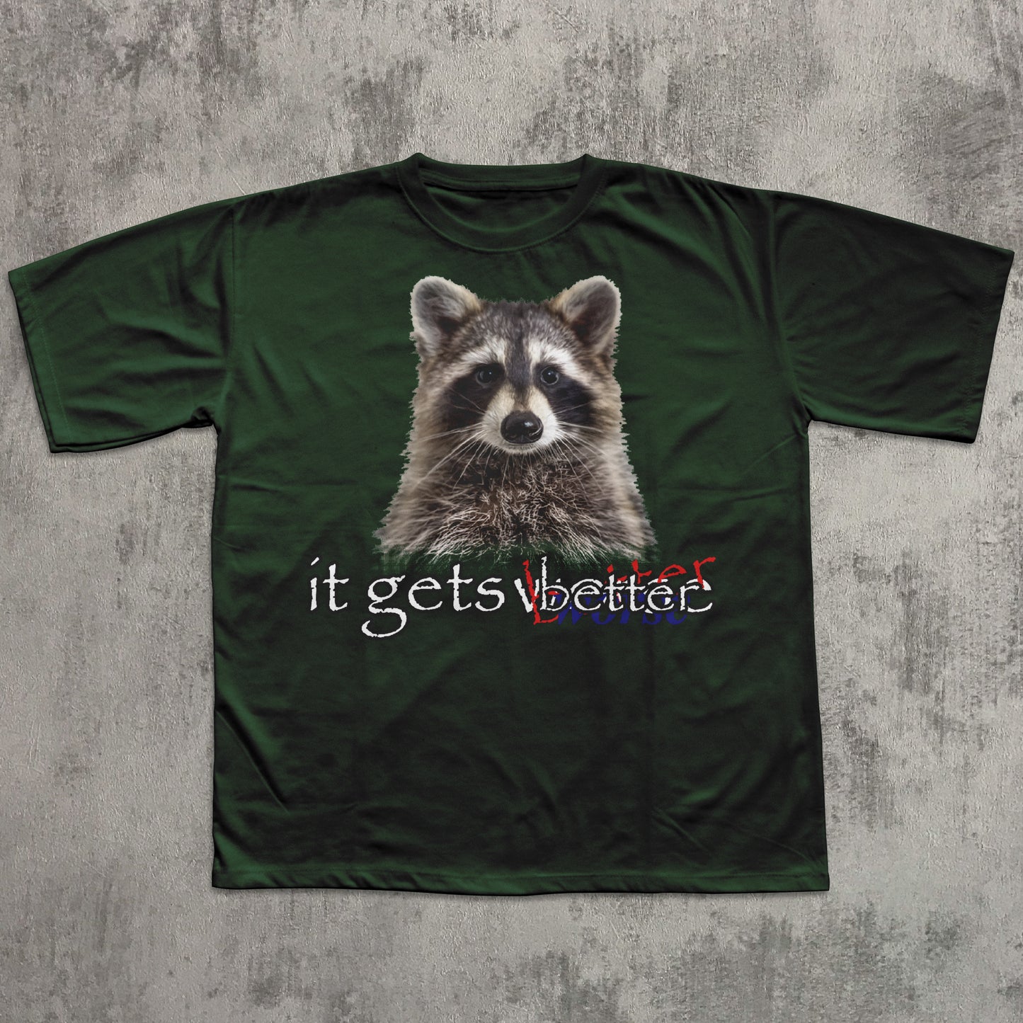 Green t-shirt with a raccoon graphic and text on a textured gray background