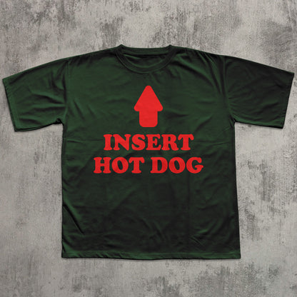 Green t-shirt with red graphic and text 'Insert Hot Dog' on a textured gray background