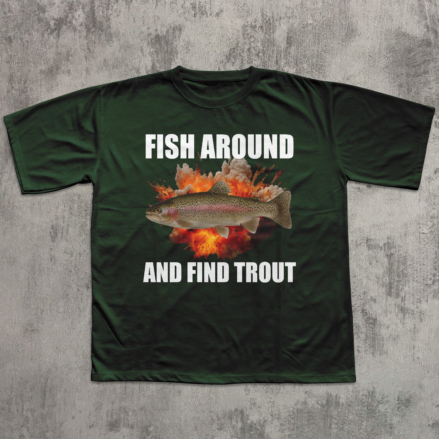 Green t-shirt with a fish graphic and text on a textured gray background
