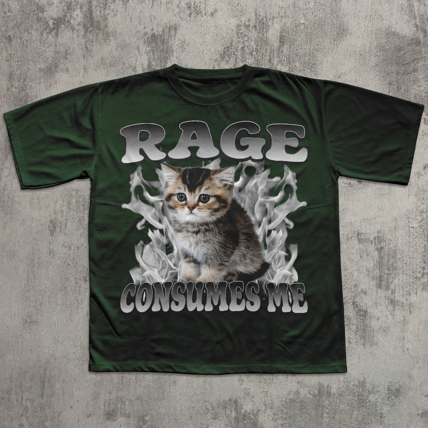 Green t-shirt with a cat graphic and text 'RAGE CONSUMES ME' on a textured gray background