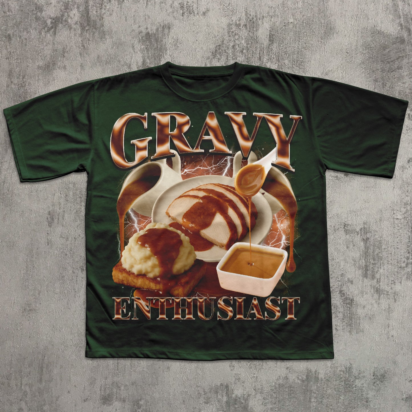Green t-shirt with a graphic of gravy and text 'Gravy Enthusiast' on a textured gray background