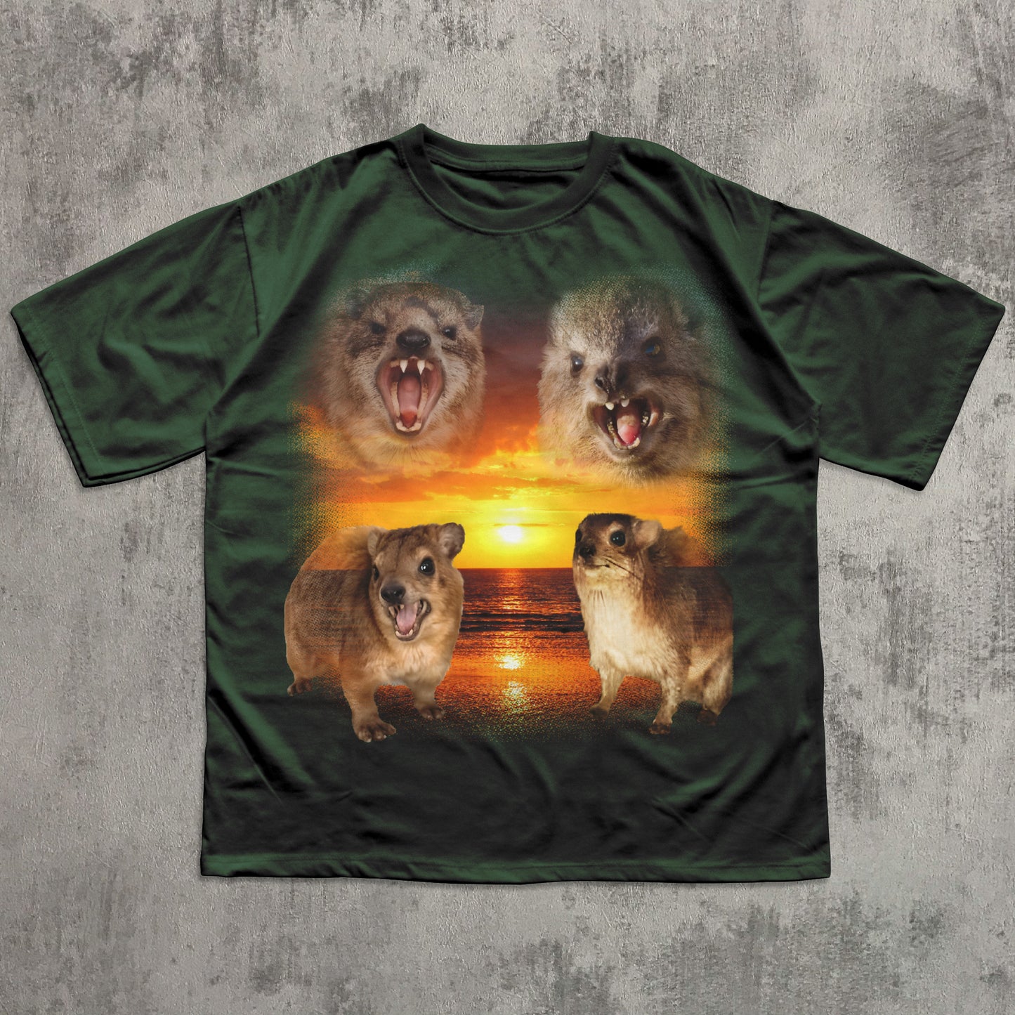 Green t-shirt with a graphic of four animals in front of a sunset on a textured gray background