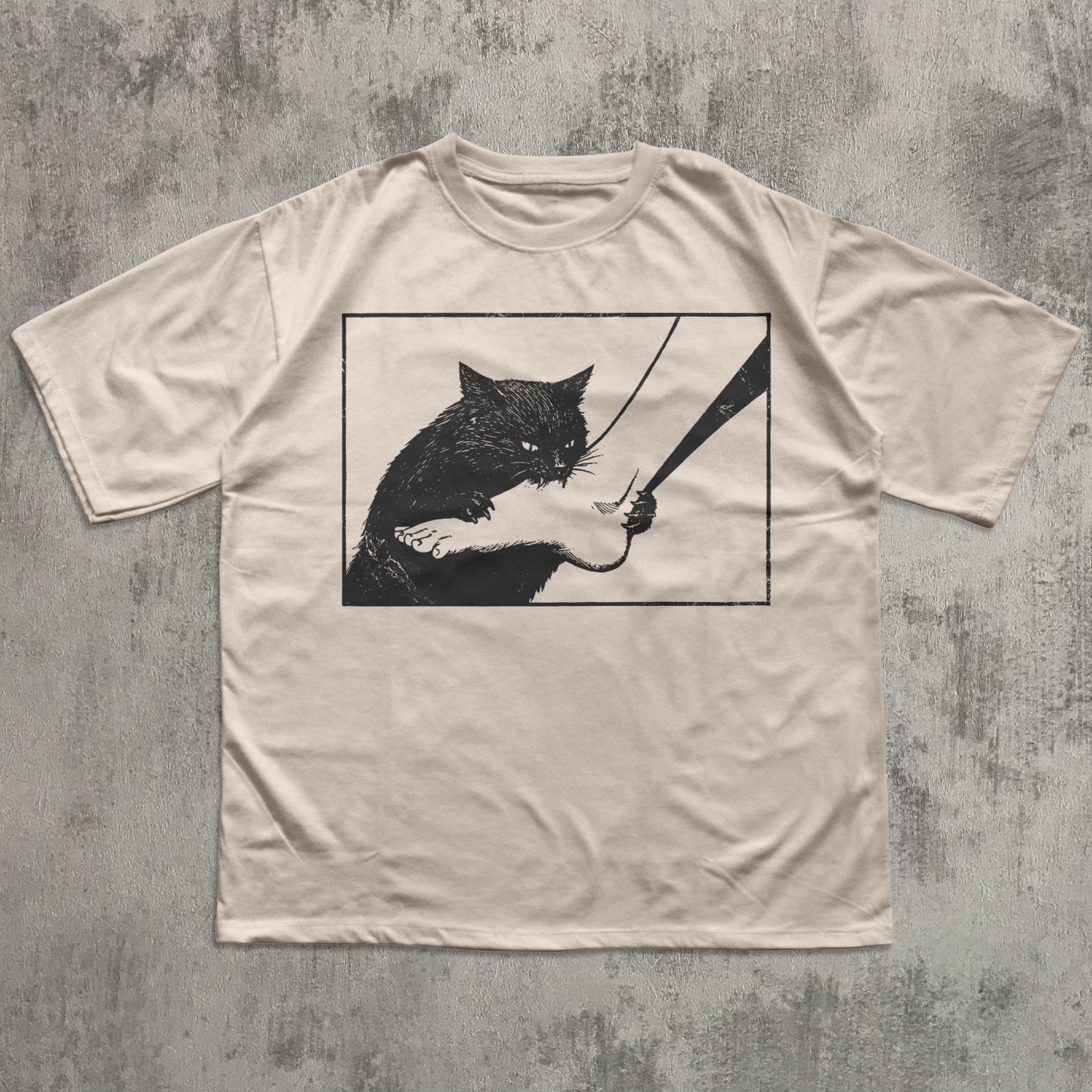 Funny black cat graphic t-shirt with mischievous cat illustration on ivory tee for cat lovers