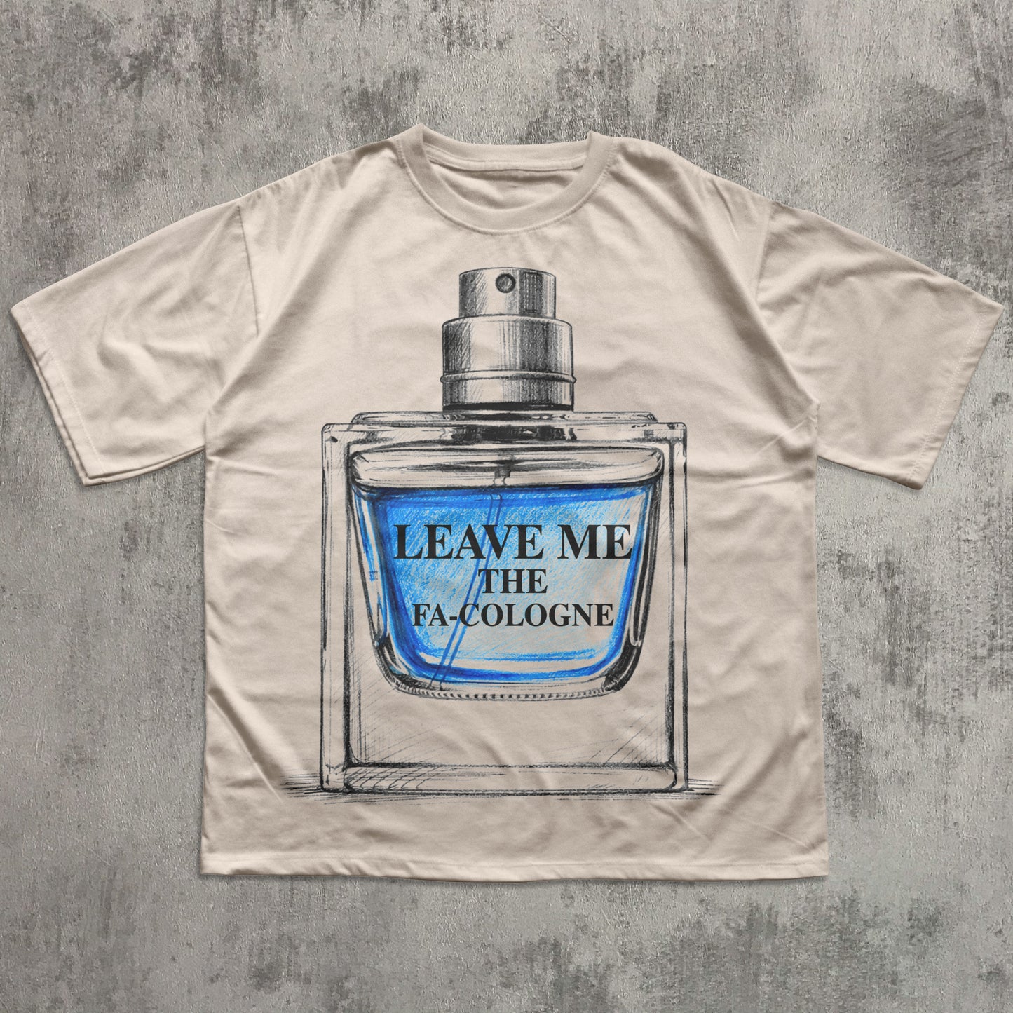 Beige t-shirt with a graphic of a cologne bottle and text 'Leave Me The FA Cologne' on a textured gray background.