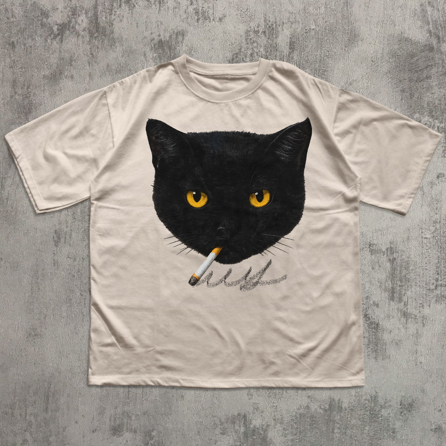 Beige t-shirt with a black cat graphic holding a cigarette on a textured gray background