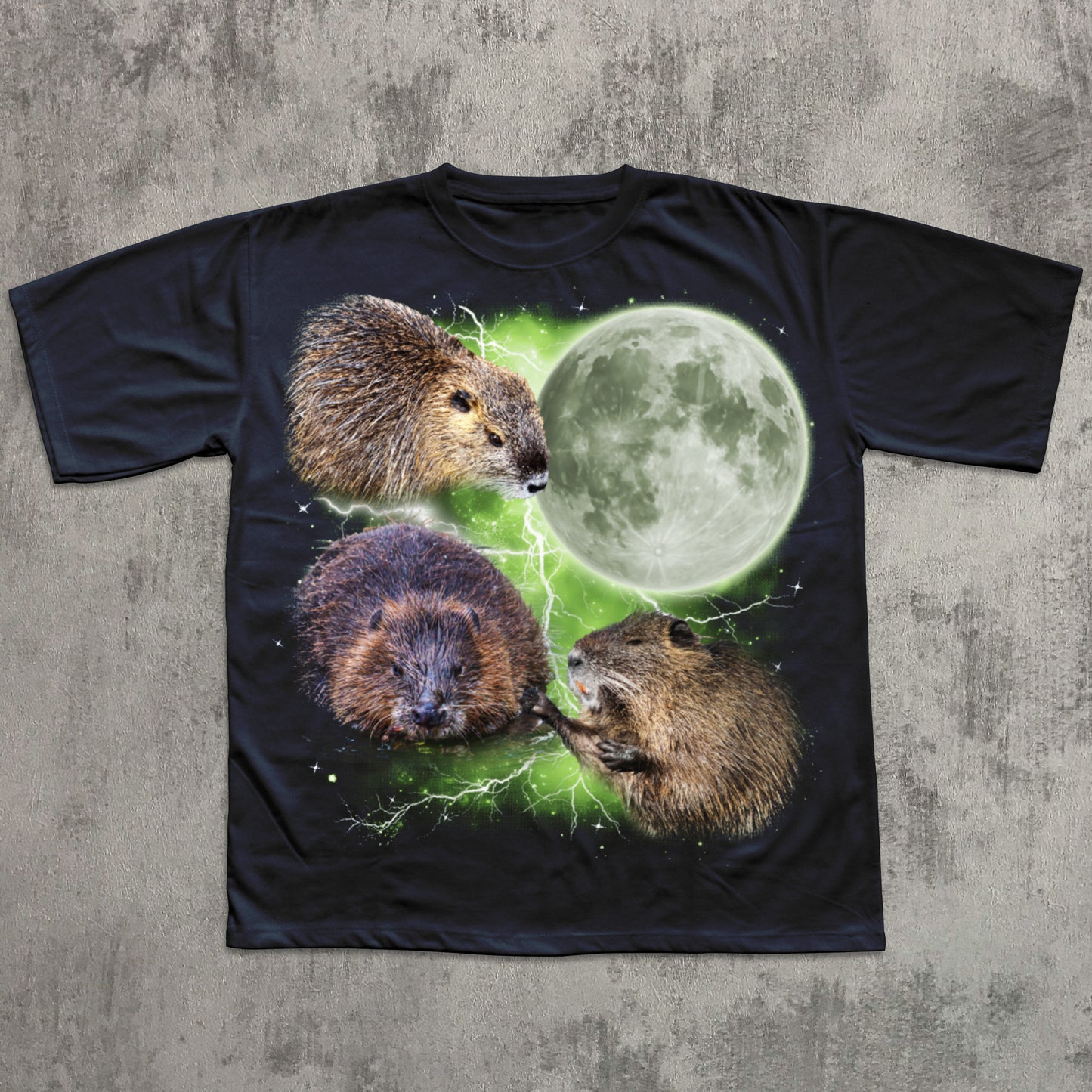 Navy graphic T-shirt featuring three realistic beavers arranged around a glowing full moon with green lightning effects in the background.