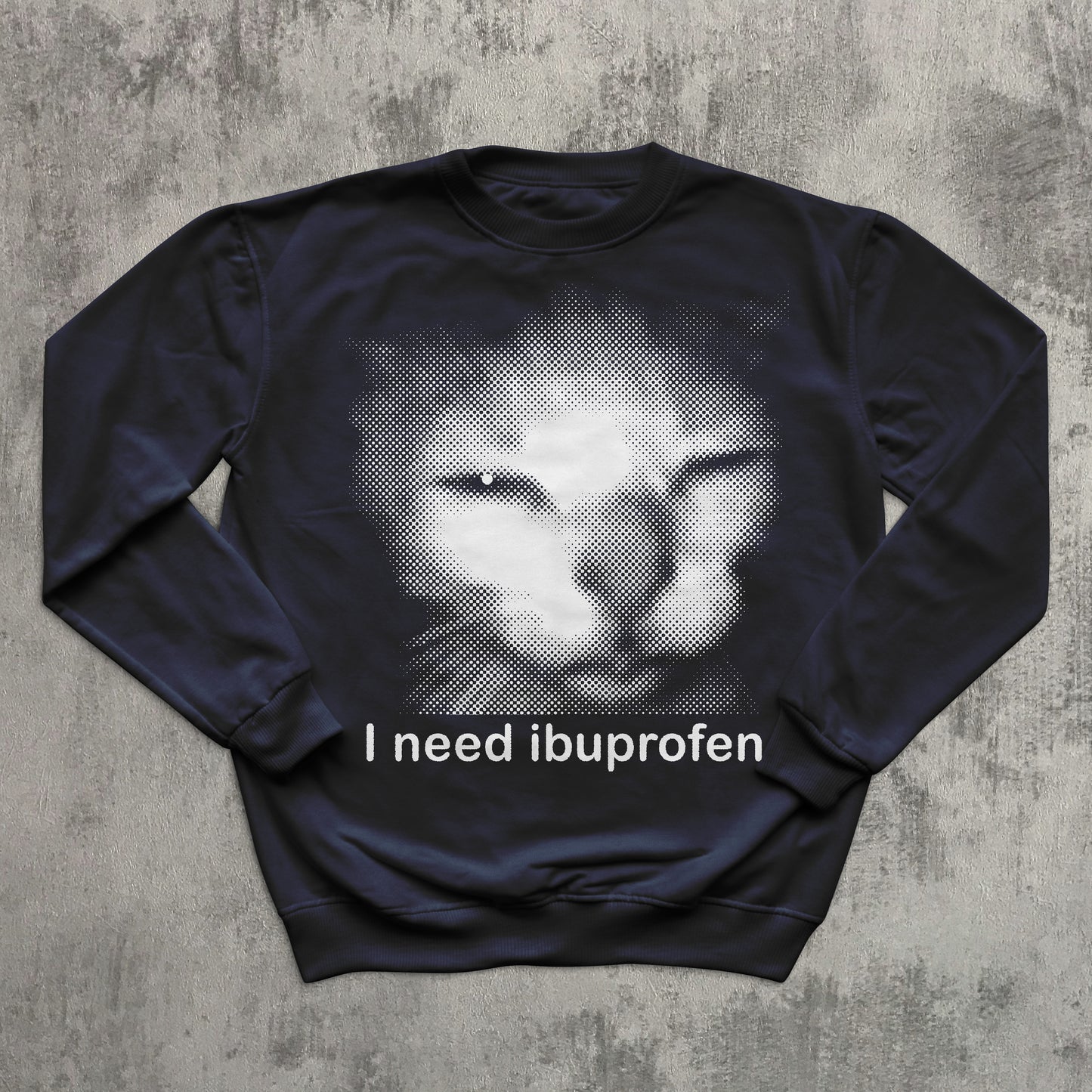 Navy graphic sweatshirt with retro halftone cat image and comedic quote ‘I need ibuprofen,’ trendy meme clothing.