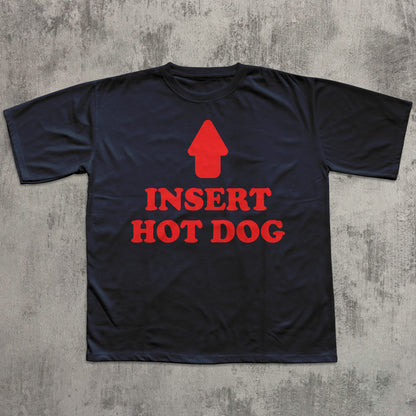 Black t-shirt with red graphic and text 'INSERT HOT DOG' on a textured gray background