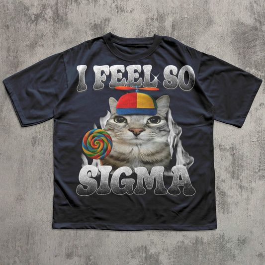 Black t-shirt with a cat meme graphic and text 'I Feel So Sigma' on a textured gray background