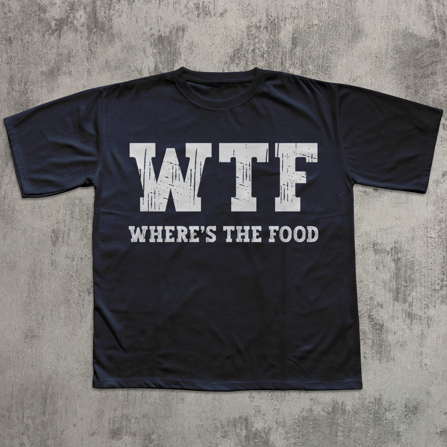 Black t-shirt with 'WTF WHERE'S THE FOOD' text on a textured gray background