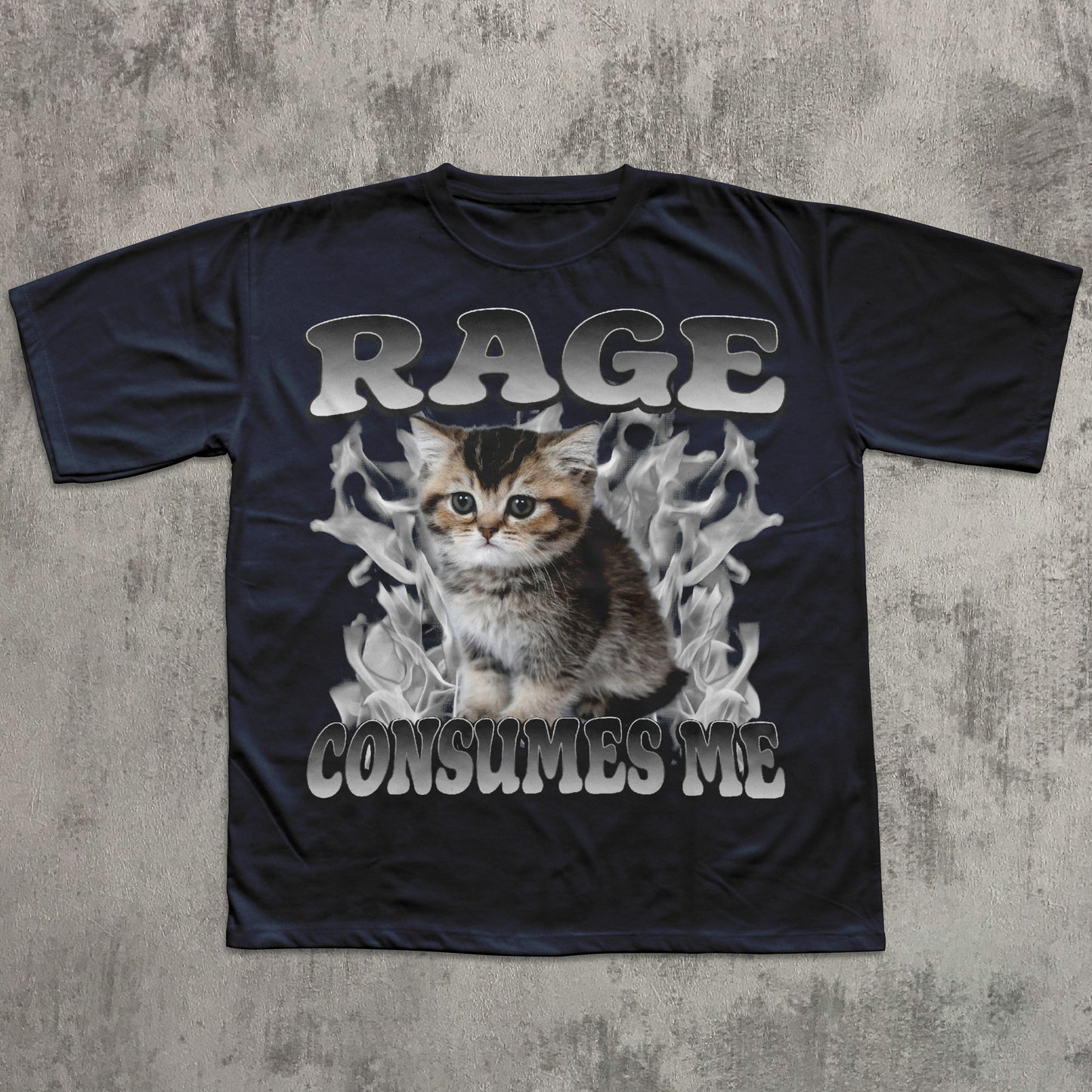 Black t-shirt with a graphic of a kitten and text 'RAGE CONSUMES ME' on a textured gray background