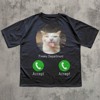 Black t-shirt with a cat graphic and 'Freaky Department' text on a textured gray background