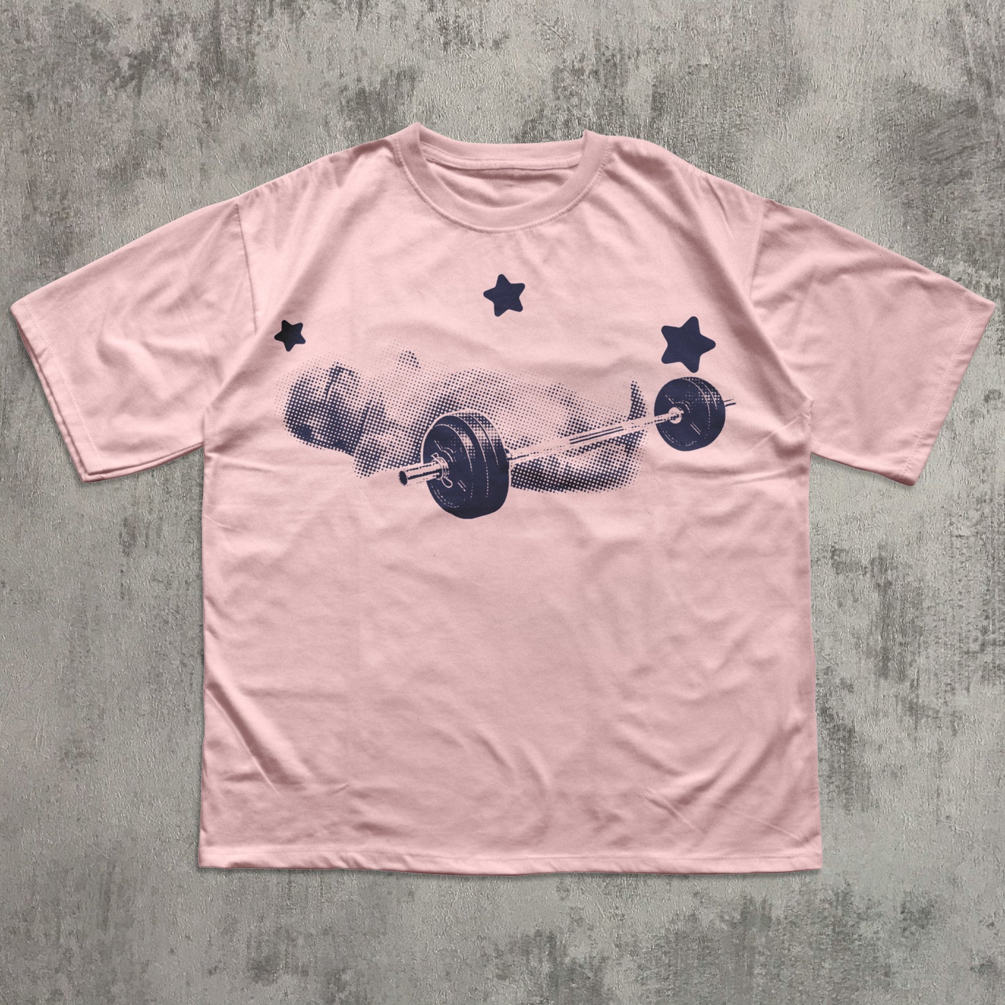 Pink t-shirt with a barbell and cat graphic