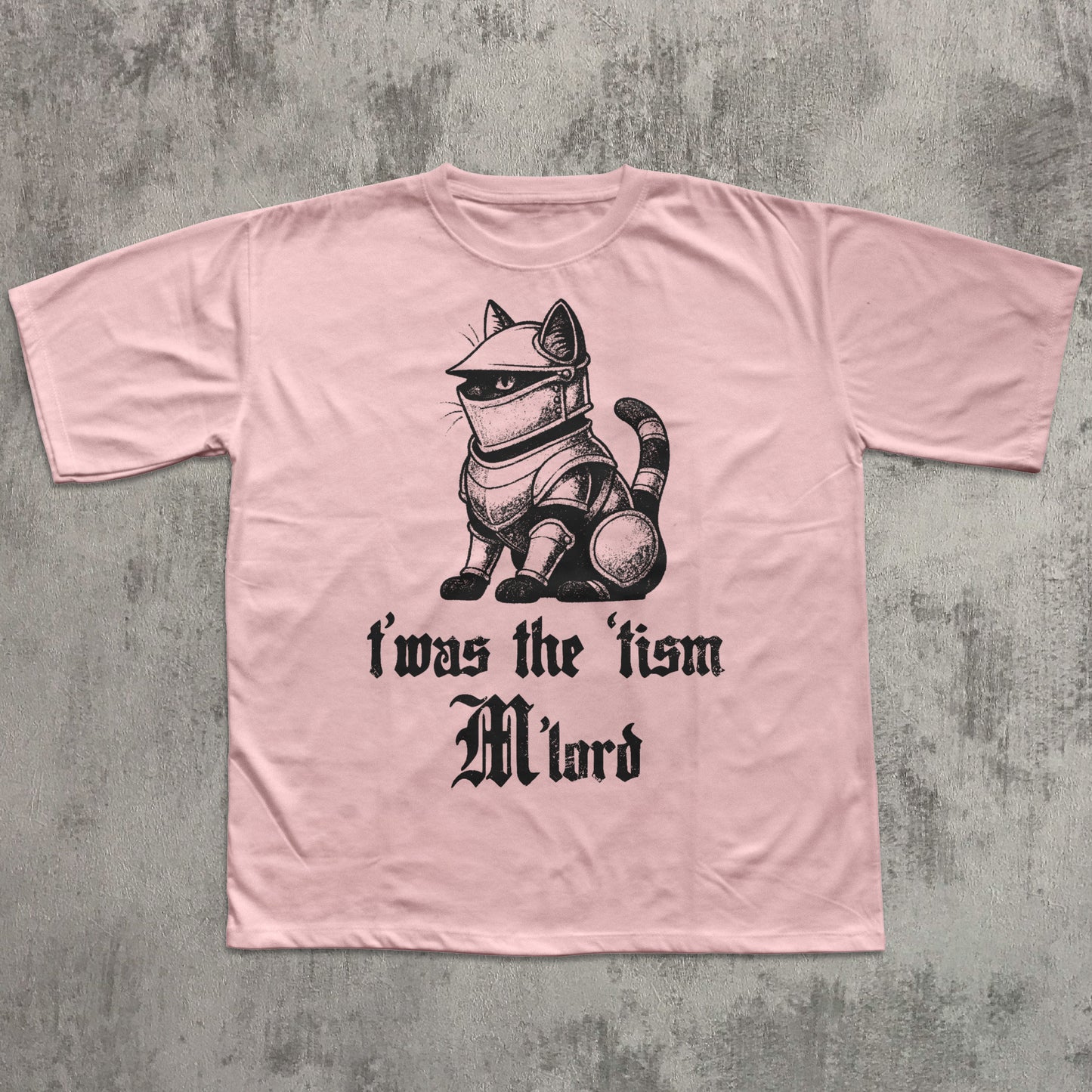 Pink t-shirt with a graphic of a cat in armor and text on a concrete background