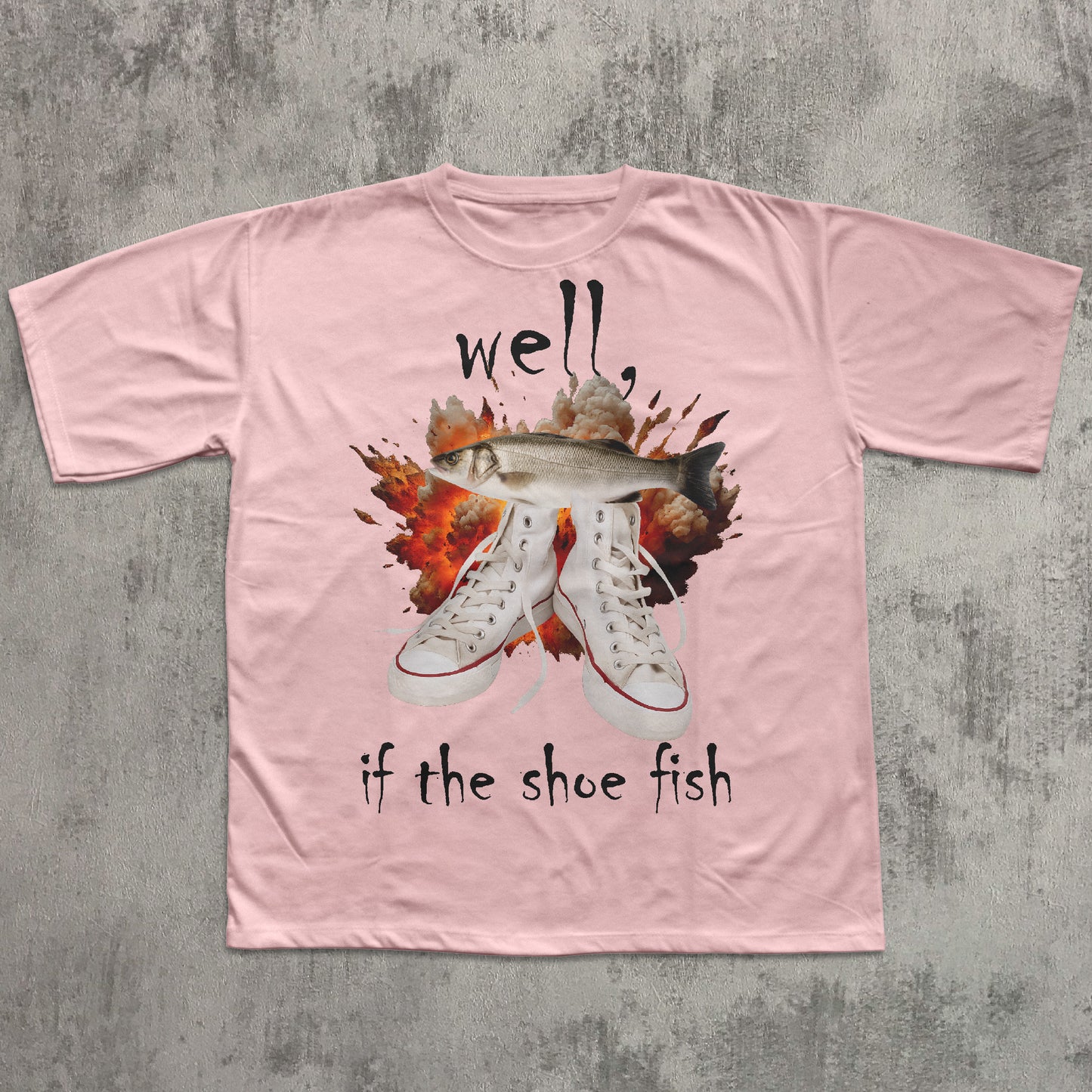 Pink t-shirt with graphic of sneakers and fish, text 'well, if the shoe fish' on a concrete background