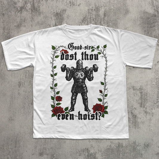White t-shirt with a graphic design of a knight lifting weights, roses, and text on a concrete background.